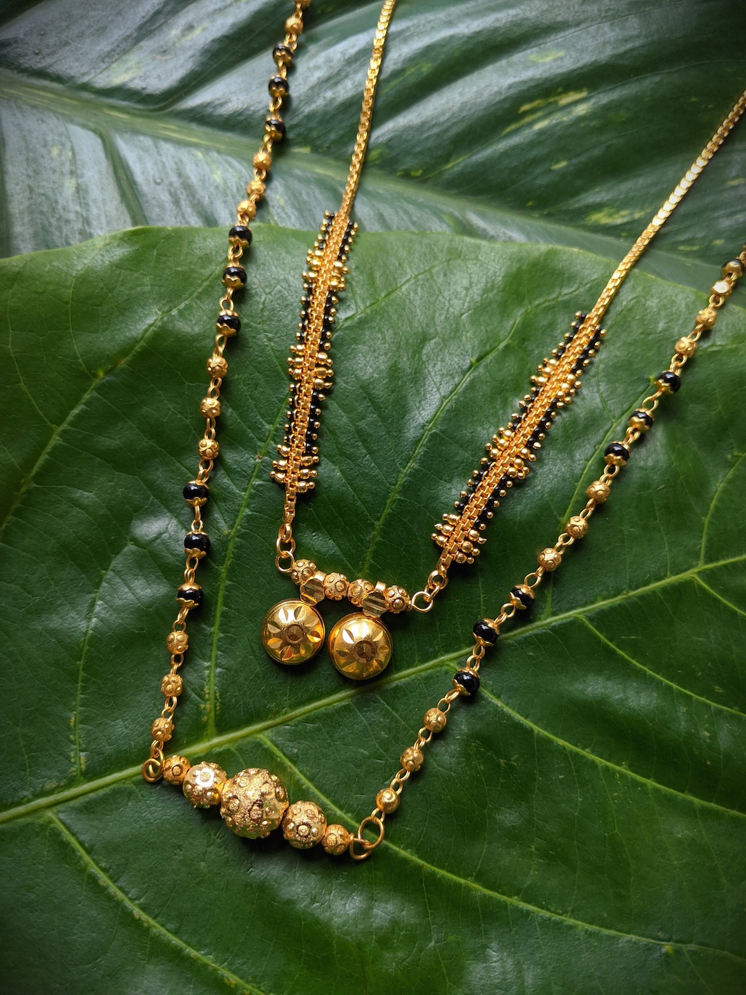 

Digital Dress Room Set of 2 Gold Plated White Stone Studded & Black Beaded Mangalsutra