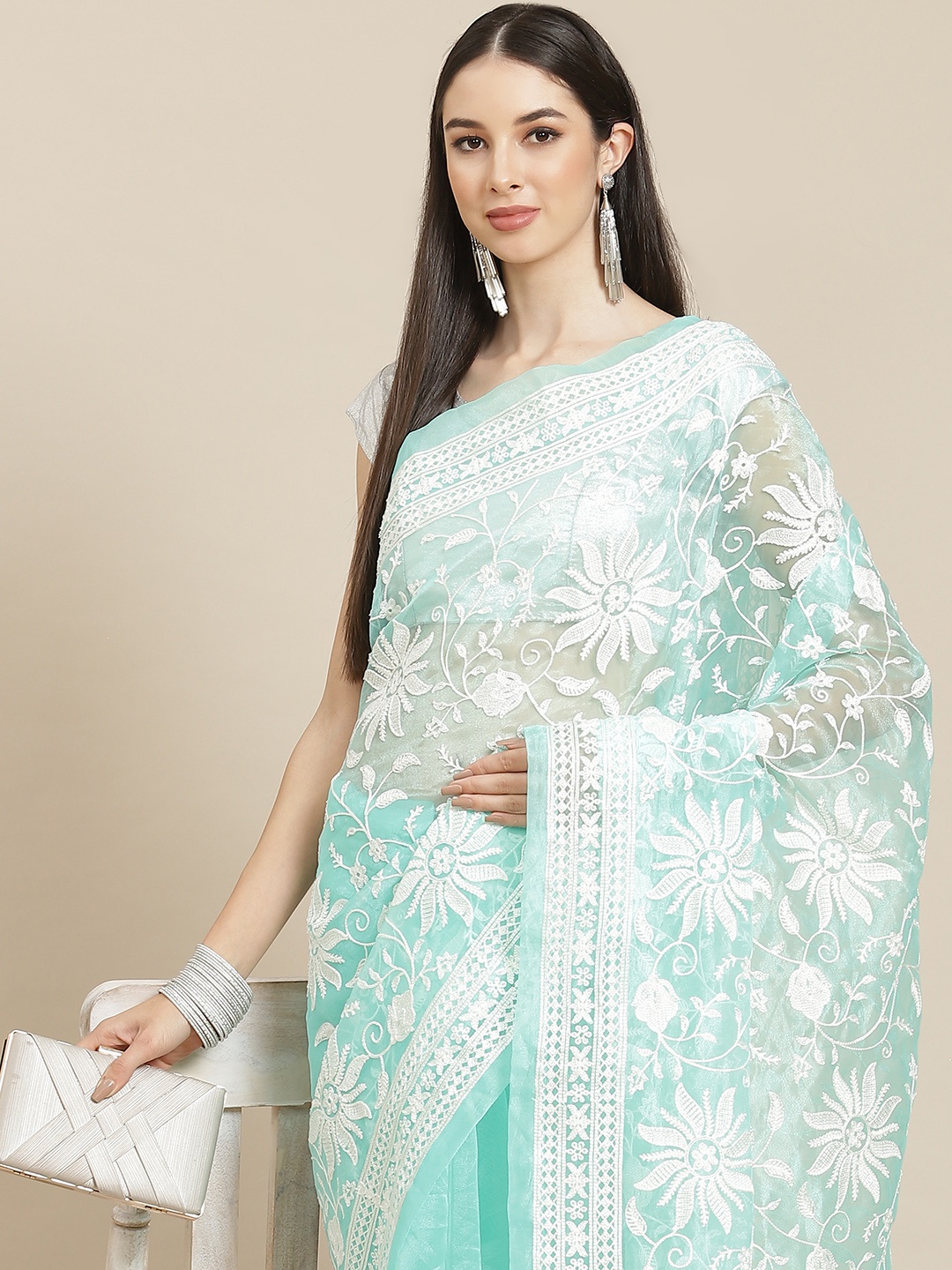 

Anouk Green & White Ethnic Motifs Organza Saree