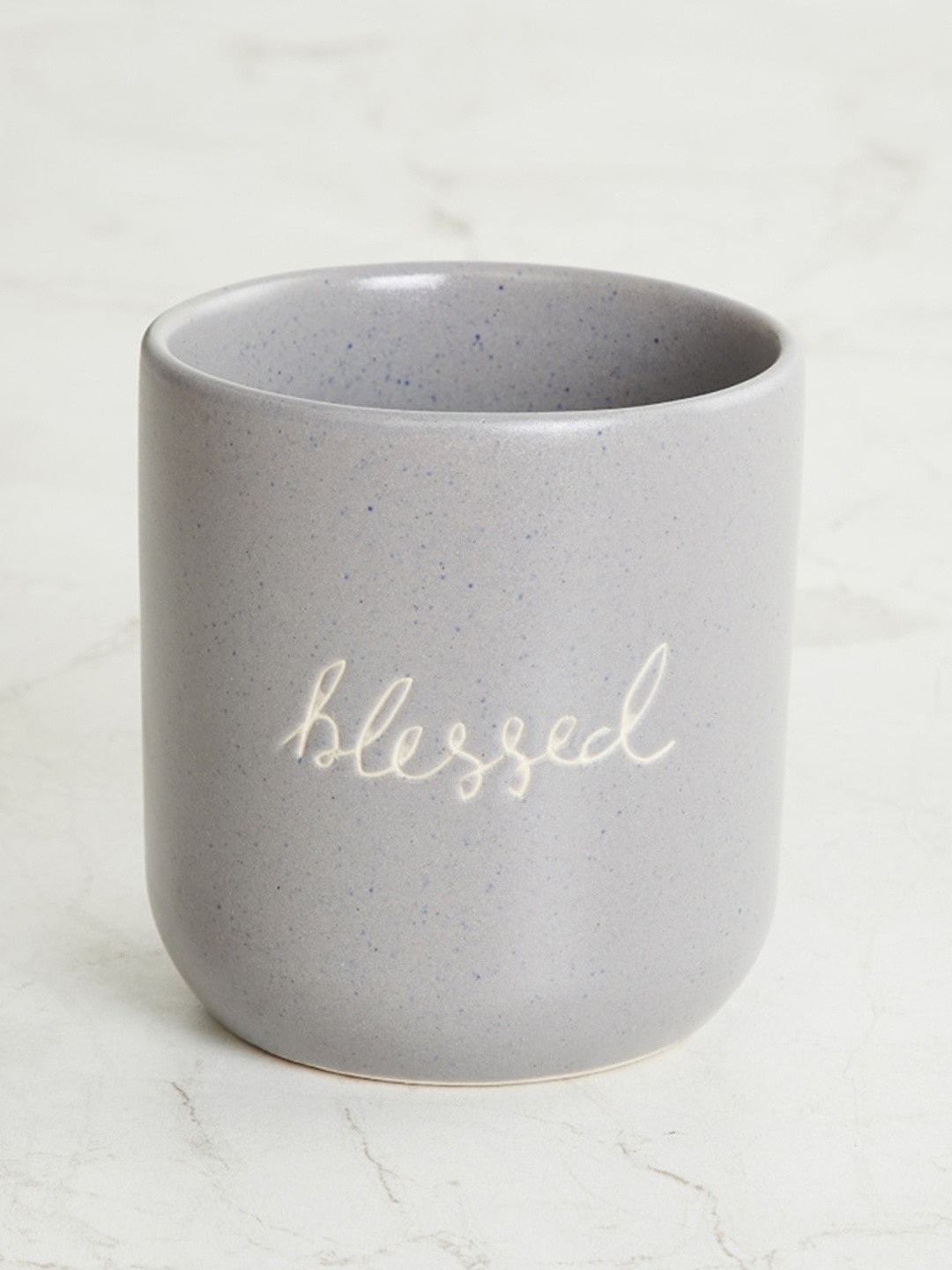 

Home Centre Grey & Beige Textured Ceramic Quote Planter
