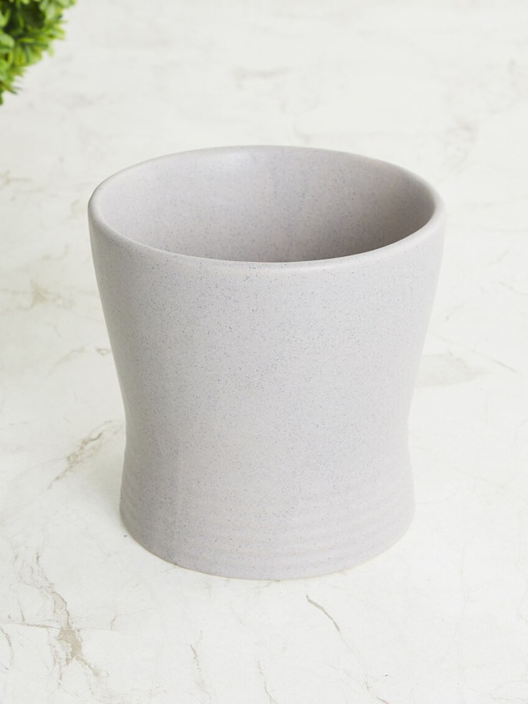 

Home Centre Grey Solid Ceramic Planter