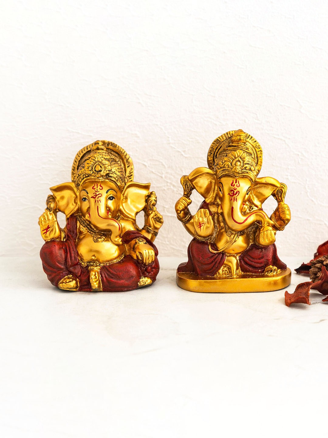 

Home Centre Set Of 2 Gold-Toned & Maroon Ganesh Figurine Showpiece