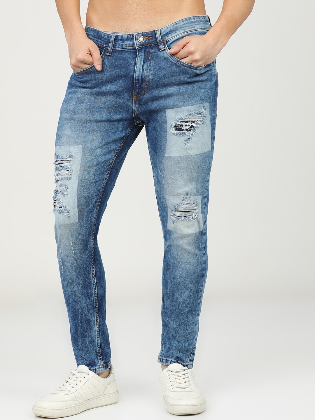 

HIGHLANDER Men Blue Tapered Fit Mildly Distressed Heavy Fade Stretchable Jeans