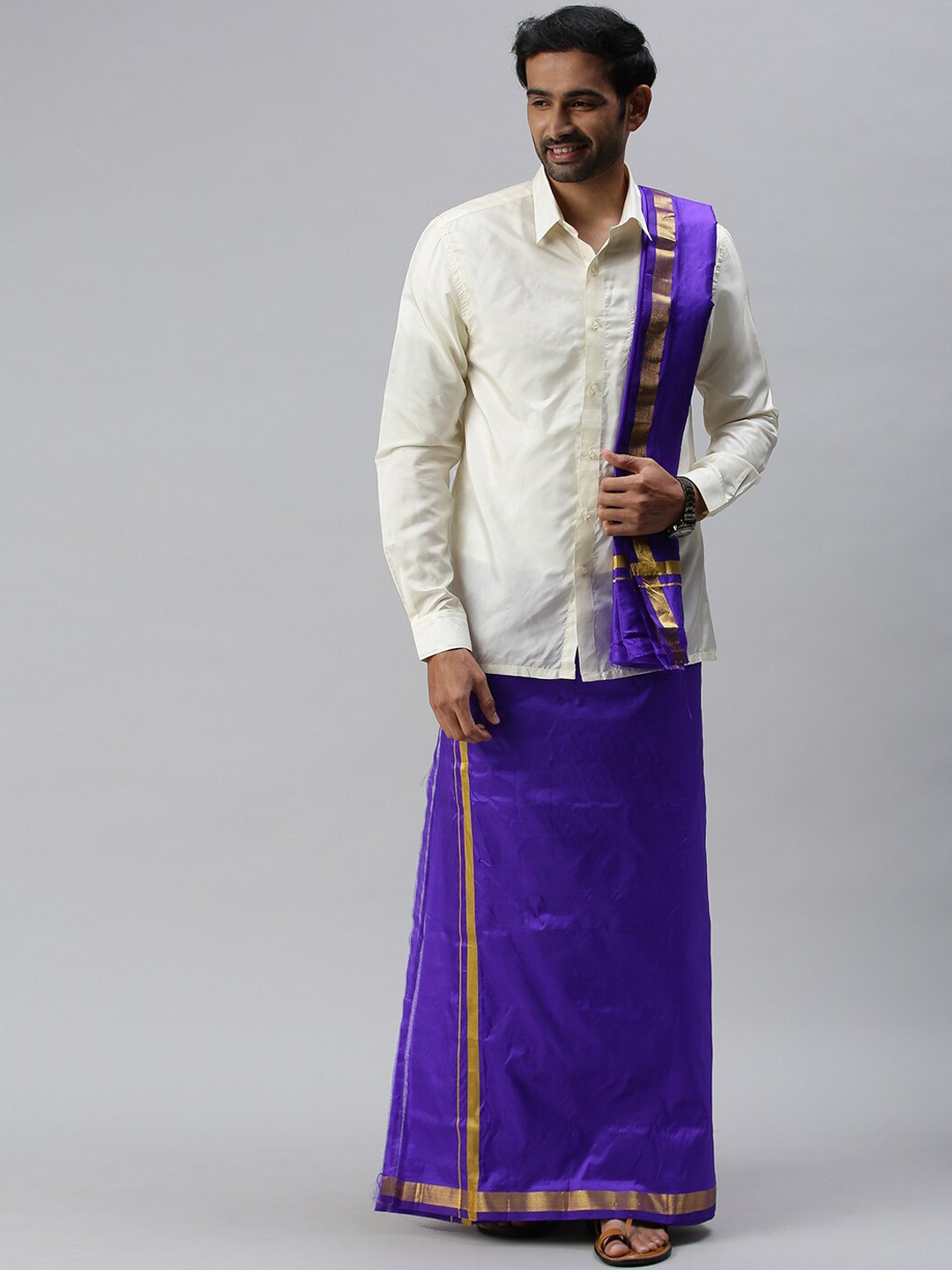 

Ramraj Mens Pure Silk Blue Solid Dhoti with Gold-Toned zari Border & Towel