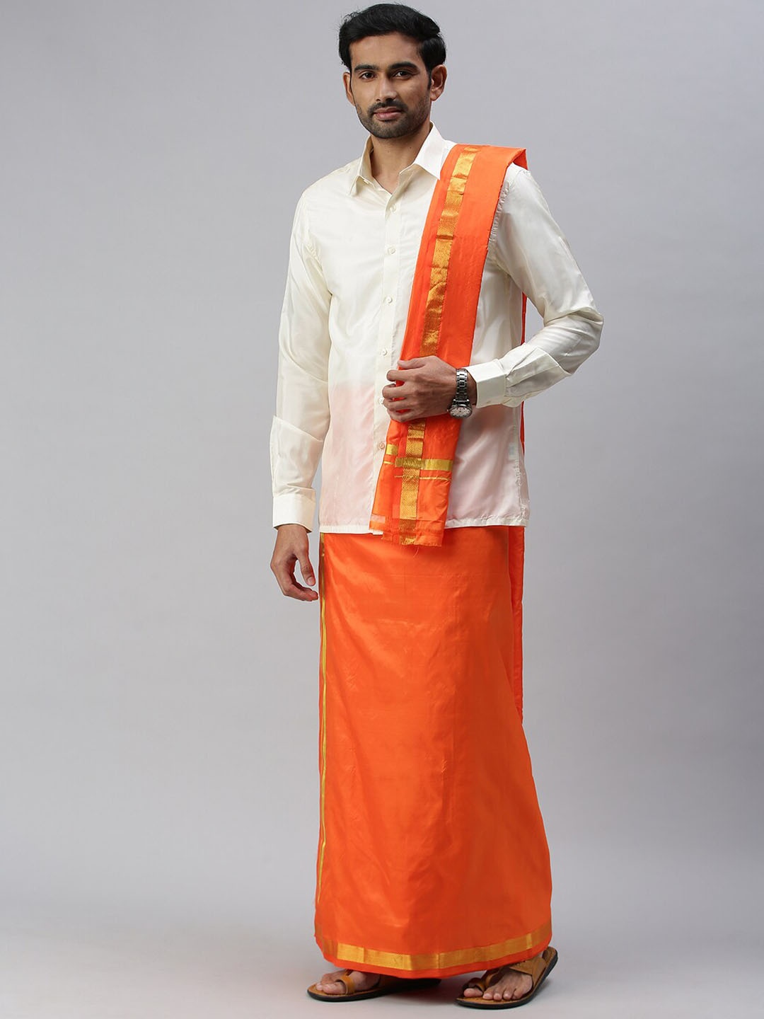 

Ramraj Mens Pure Silk Orange Dhoti with Gold-Toned zari Border & Towel