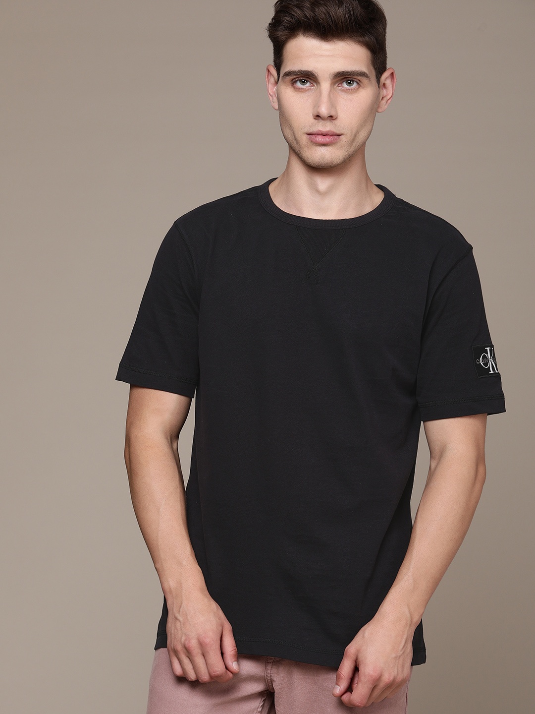 

Calvin Klein Jeans Men Black Solid Organic Cotton T-shirt