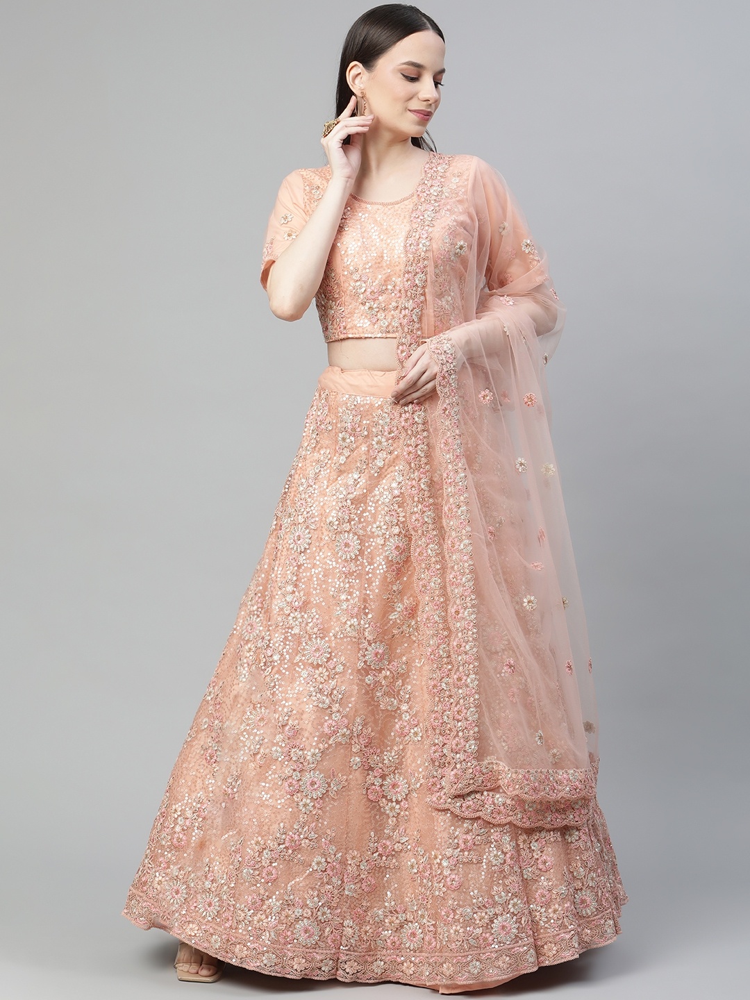 

Readiprint Fashions Peach-Coloured Embroidered Sequinned Semi-Stitched Lehenga & Unstitched Blouse With