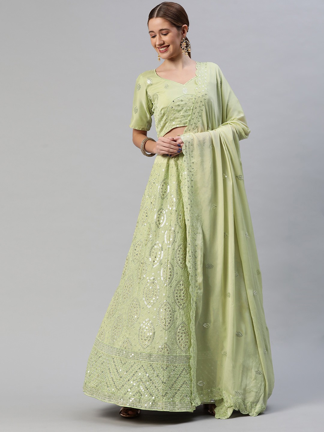 

Readiprint Fashions Green Embroidered Sequinned Semi-Stitched Lehenga & Unstitched Blouse With Dupatta