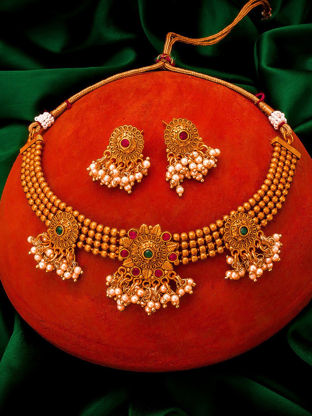 

aadita Gold-Plated & Green Kundan-Studded & Pearl Beaded Temple Handcrafted Jewellery Set