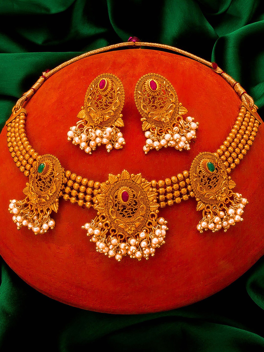 

aadita Gold-Plated Pink Stone-Studded Pearls Beaded Temple Jewellery Set