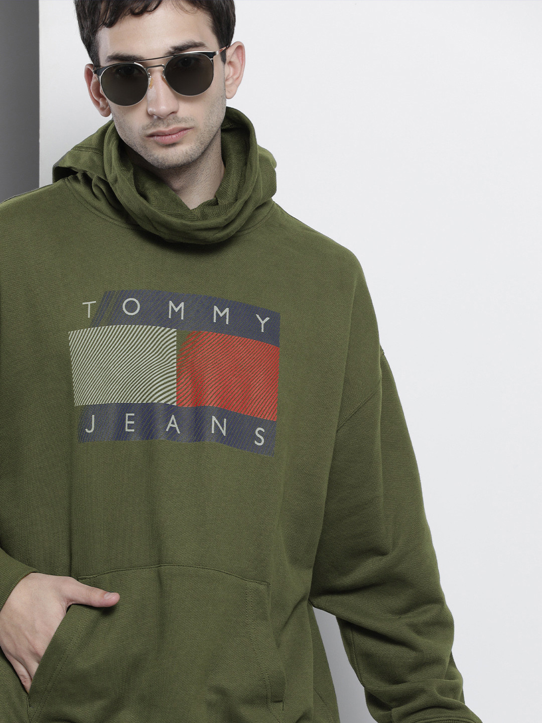 

Tommy Hilfiger Men Olive Green Printed Hooded Sweatshirt