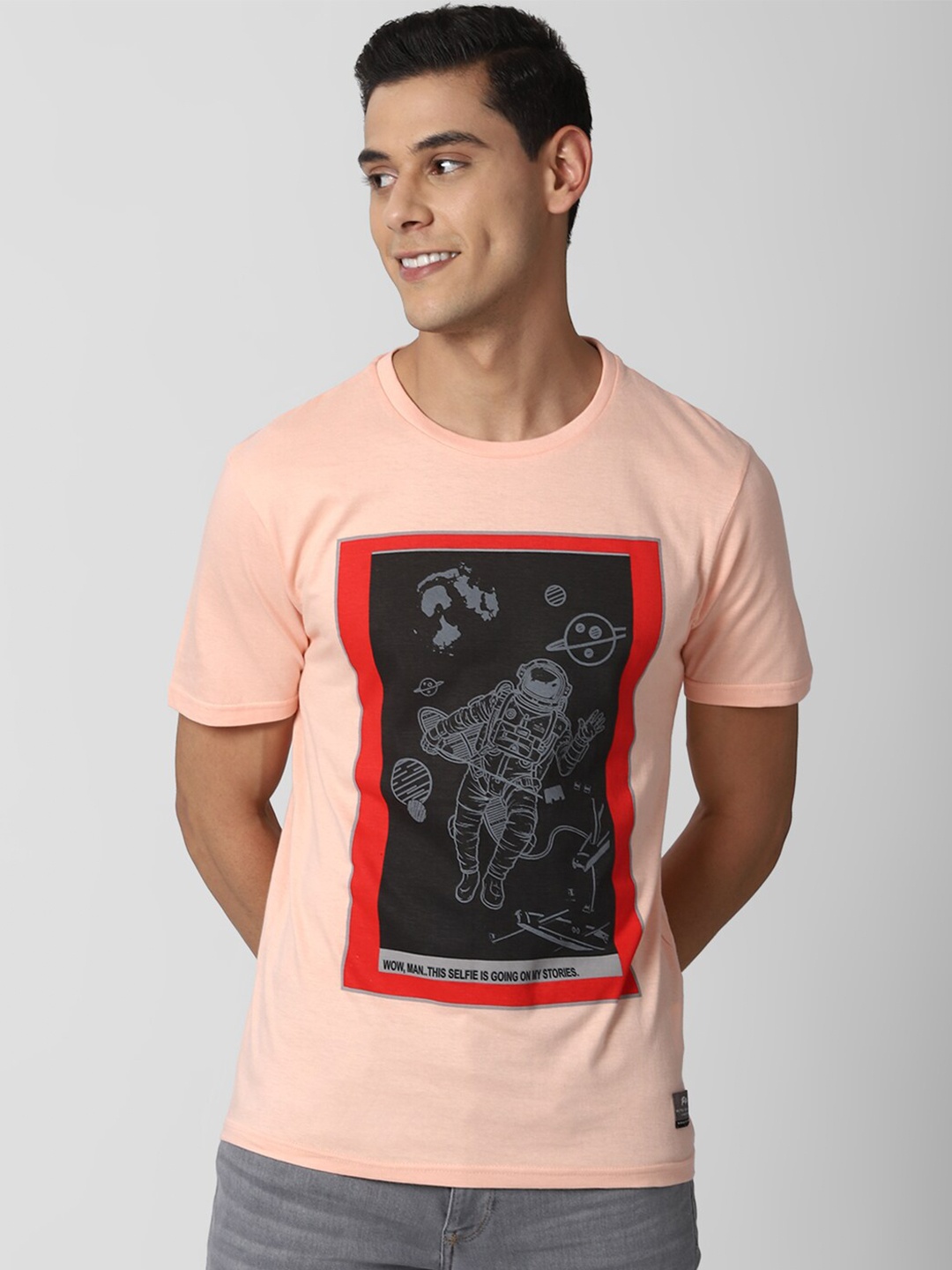 

Peter England Casuals Men Peach-Coloured Printed Slim Fit Cotton T-shirt