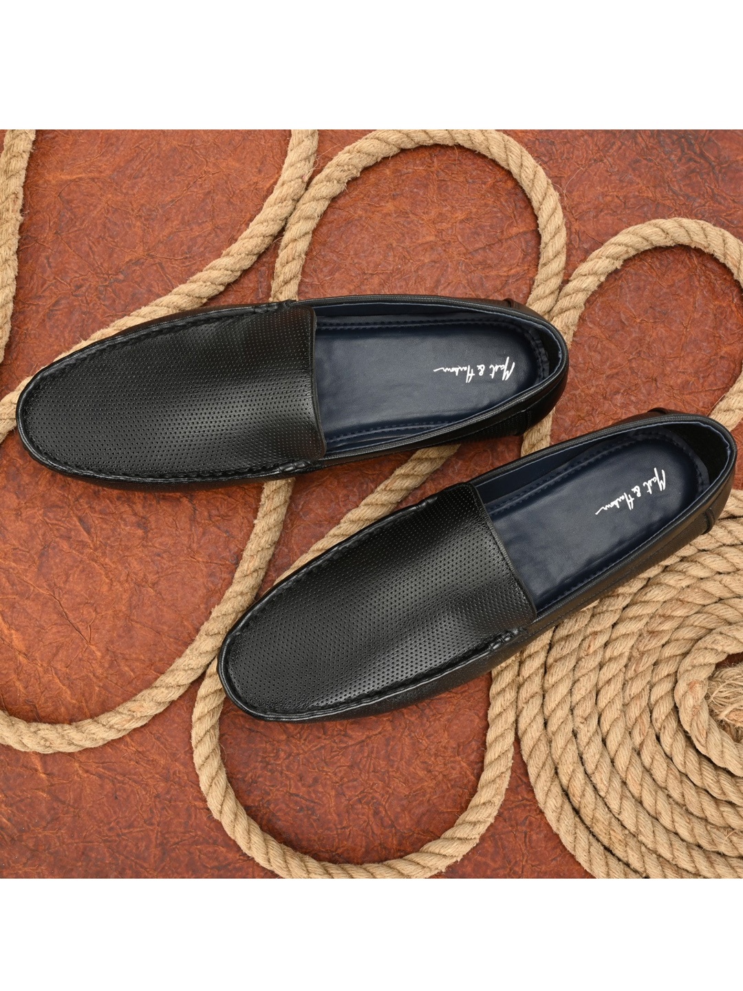 

Mast & Harbour Men Black Textured Loafers