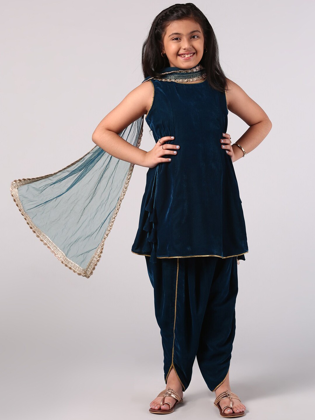 

Libas KIDS Girls Teal Pleated Velvet Kurta with Dhoti Pants & With Dupatta