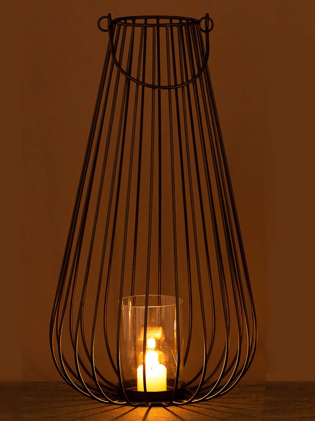 

Aapno Rajasthan Black & Transparent Lantern Shape Tealight Holder