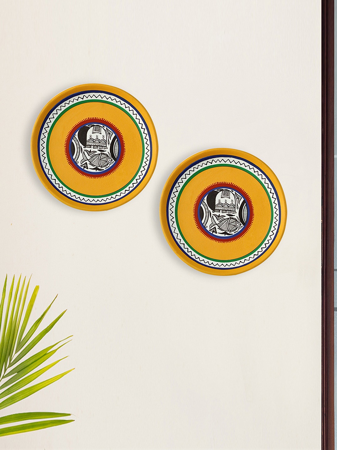 

ExclusiveLane Set of 2 Terracotta Madhubani Wall Plates Handpainted Wall Decor, Yellow