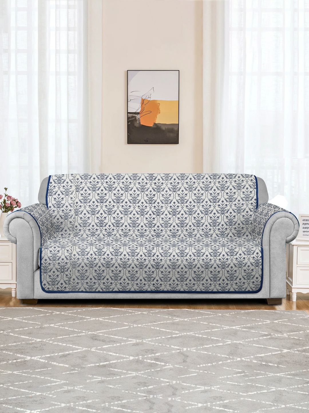 

Rajasthan Decor White & Blue Printed 2 Seater Quilted Cotton Sofa Cover
