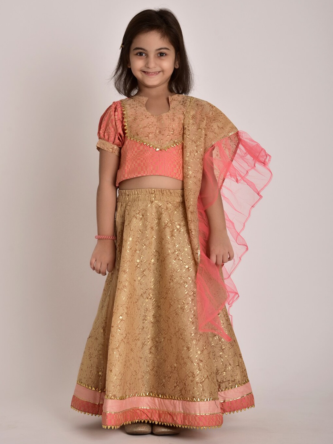 

CUTE LEMONS Girls Gold-Toned & Peach-Coloured Embellished Ready to Wear Lehenga & Blouse With Dupatta