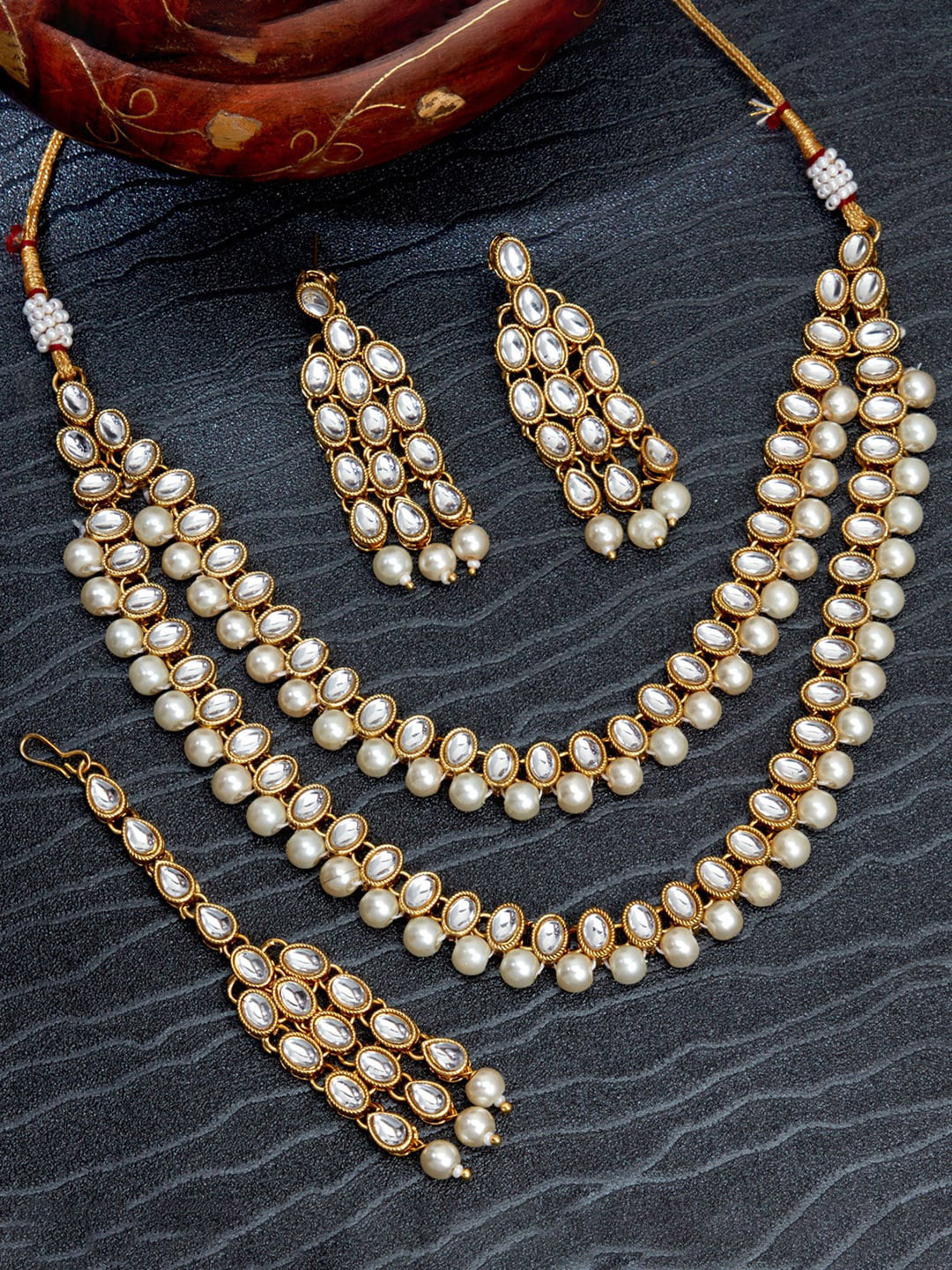 

Sukkhi Gold-Plated White Kundan-Studded & Pearl Beaded Jewellery Set