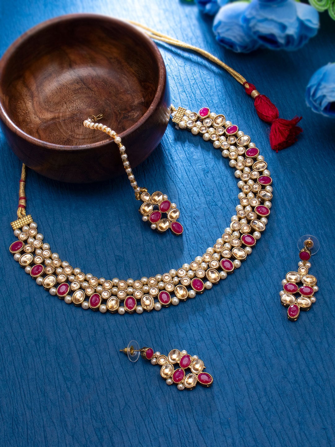 

Sukkhi Gold-Plated Pink Stone-Studded & Pearl Beaded Jewellery Set