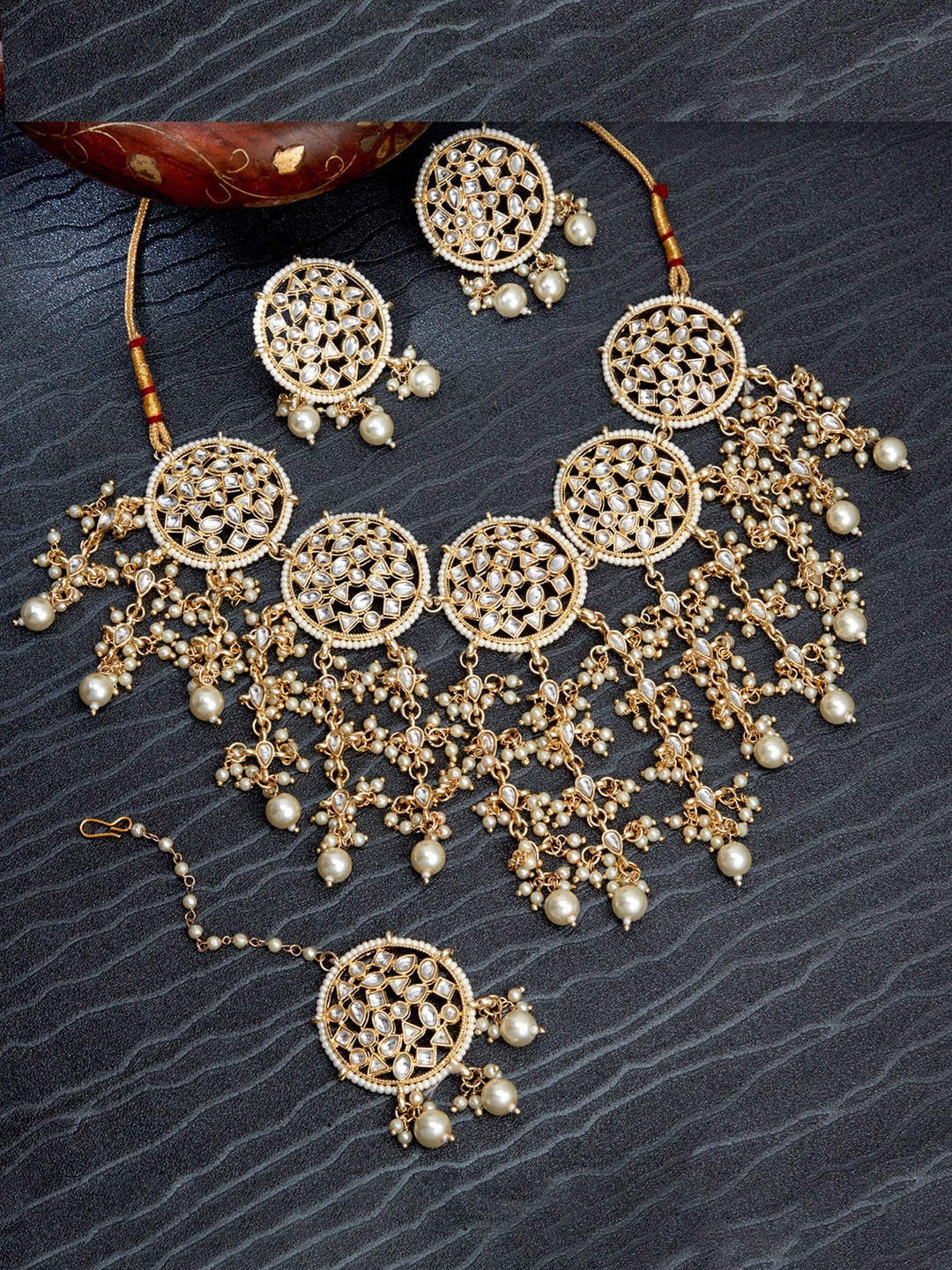 

Sukkhi Gold-Plated White Kundan & Beige Beaded Studded Jewellery Set