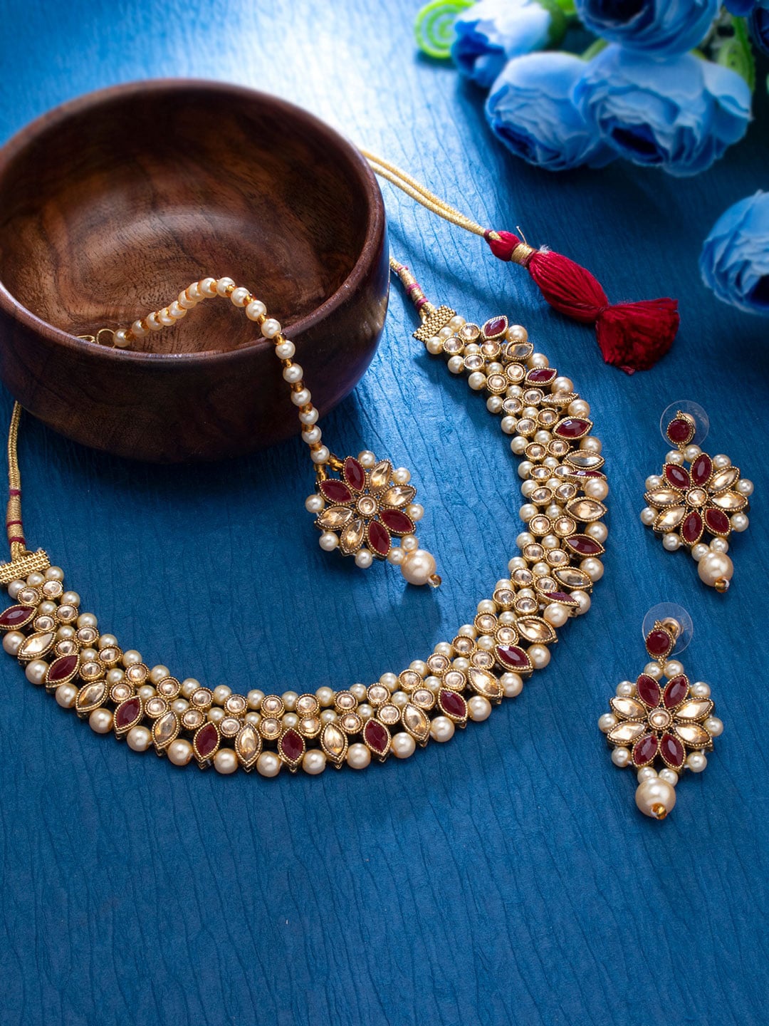 

Sukkhi Gold-Plated Pink Kundan & Beige Beaded Studded Jewellery Set