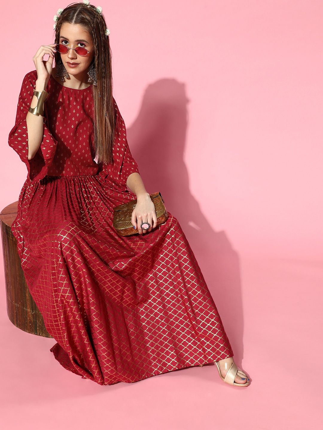 

InWeave Women Charming Maroon Self Design Ethnic Motifs Top