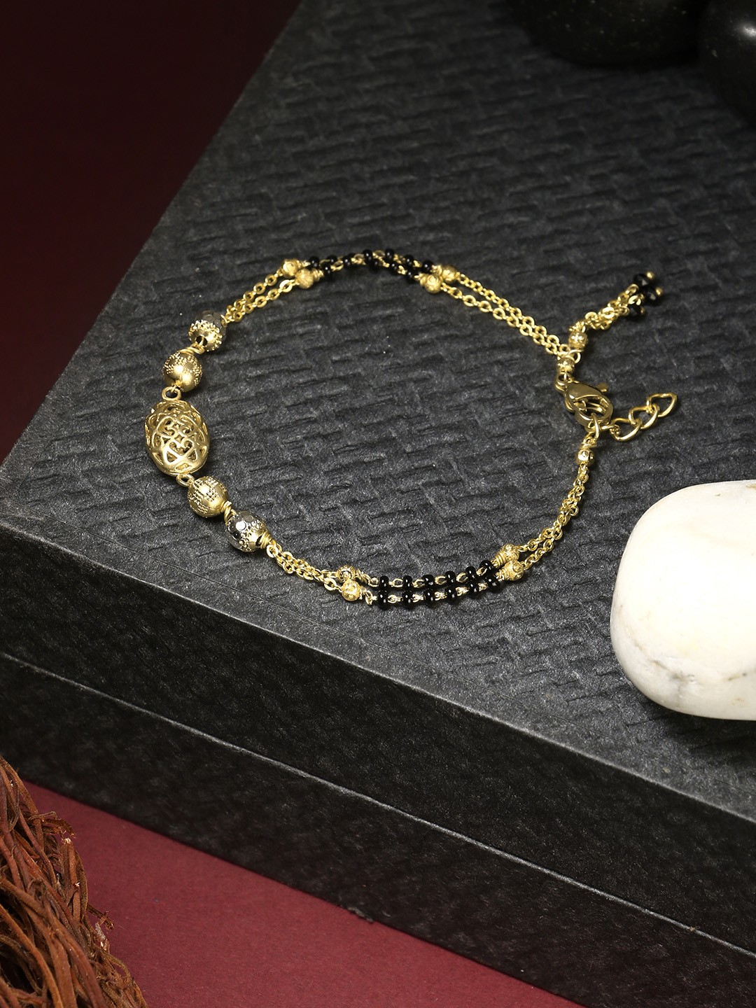 

Adwitiya Collection Women Gold-Plated & Black Brass Mangalsutra Bracelet