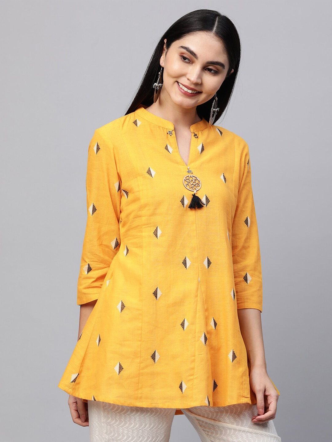 

FASHOR Yellow Geometric Printed Pure Cotton A-Line Kurti