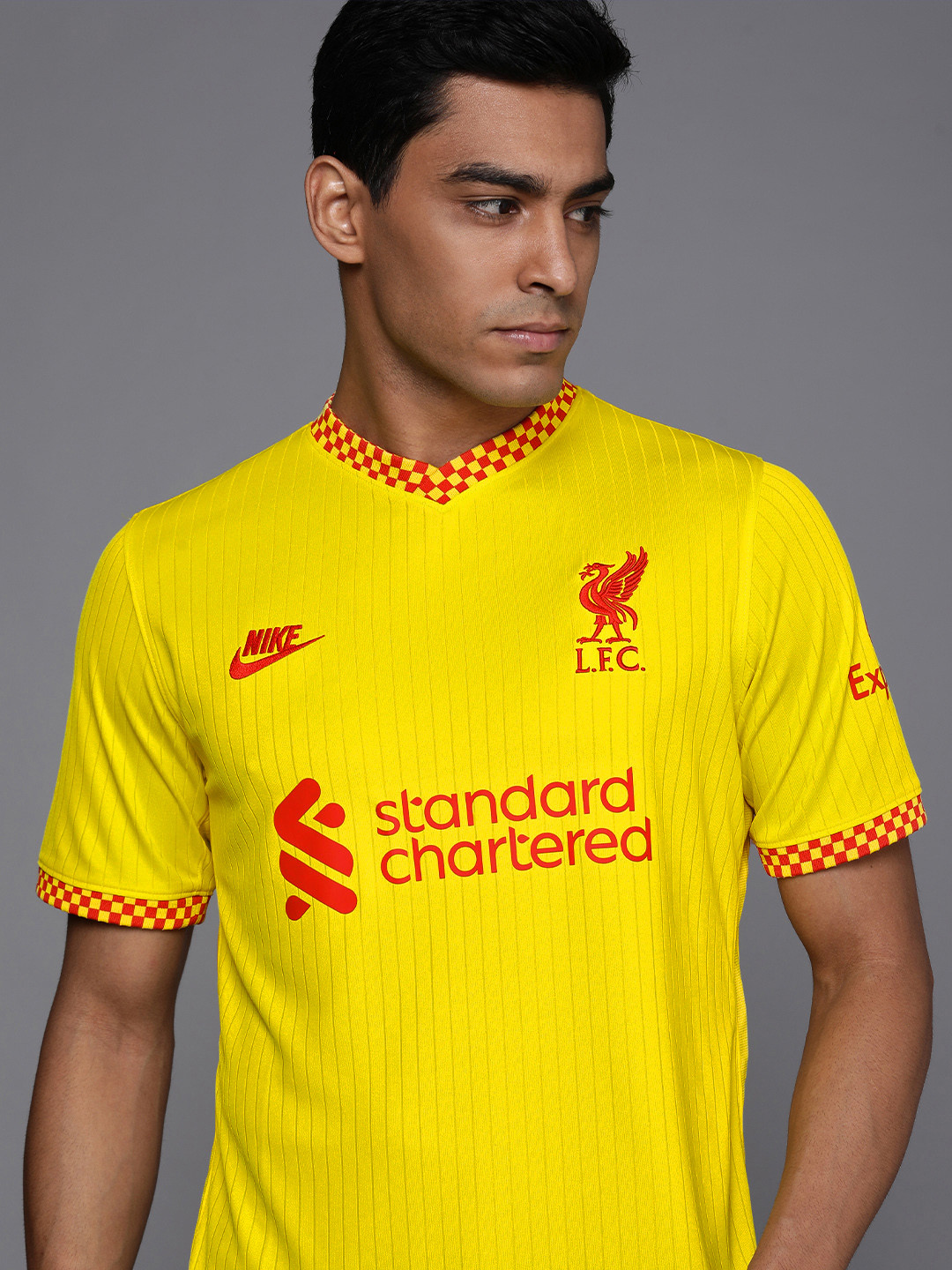 

Nike Men Yellow Graphic Printed V-Neck Football T-shirt