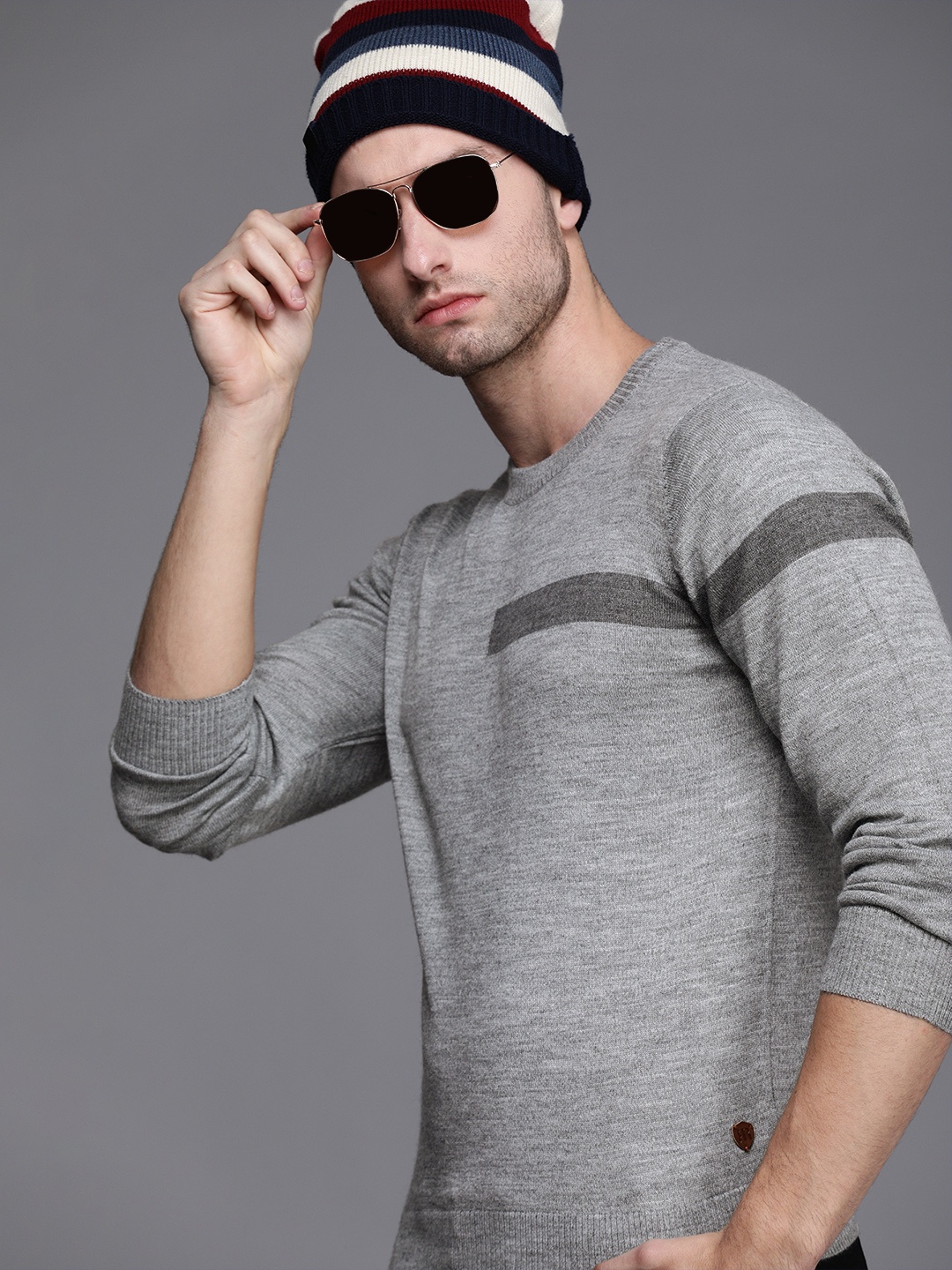 

Raymond Men Grey Solid Round Neck Long Sleeves Pullover Sweater