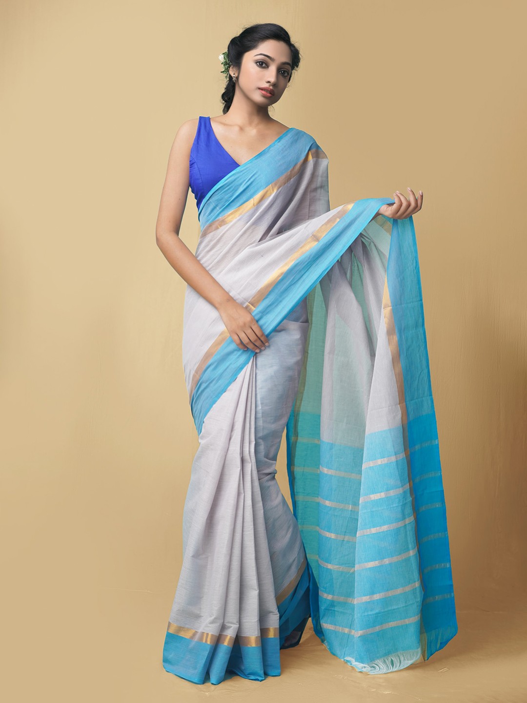 

Unnati Silks Grey & Blue Striped Pure Cotton Mangalagiri Saree