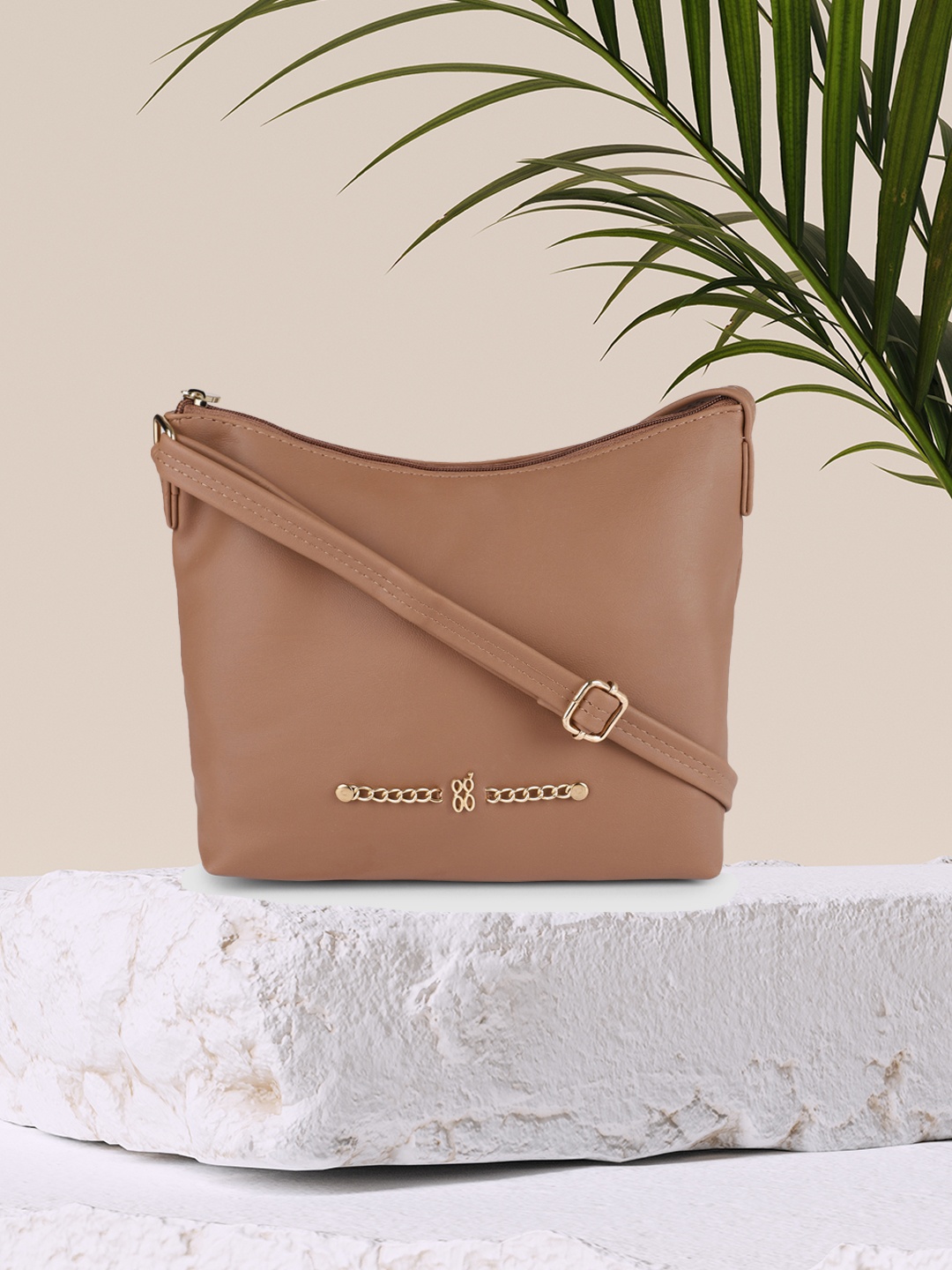 

Baggit Beige Solid Sling Bag
