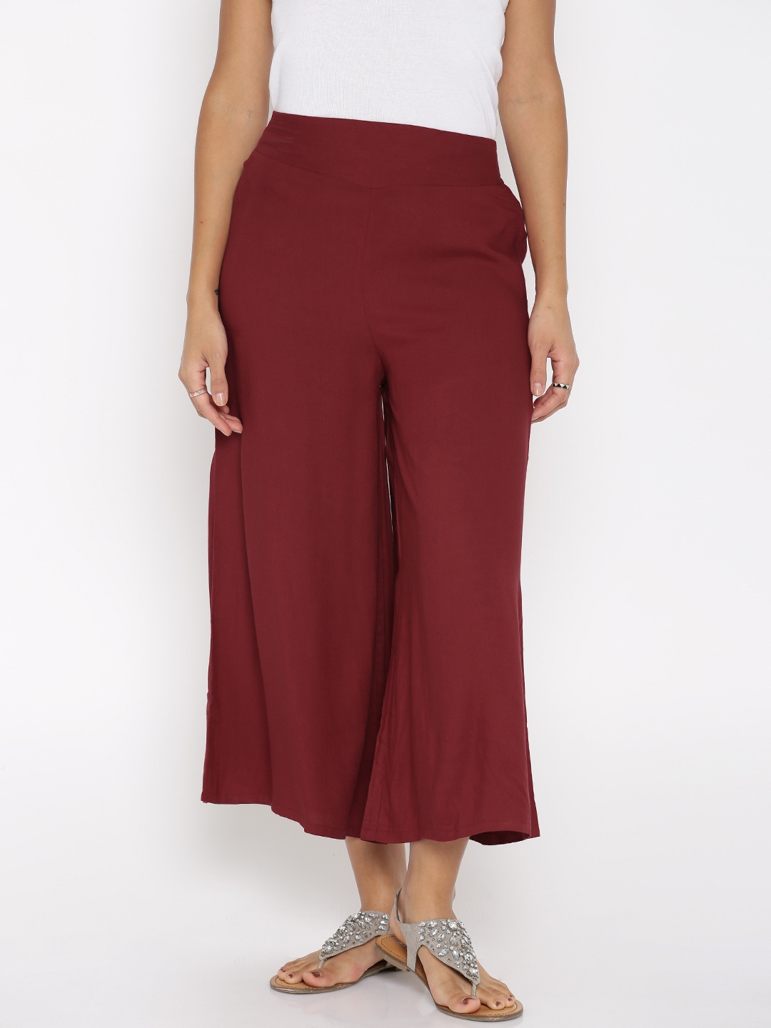 

Desi Weavess Women Maroon Solid Palazzo Trousers