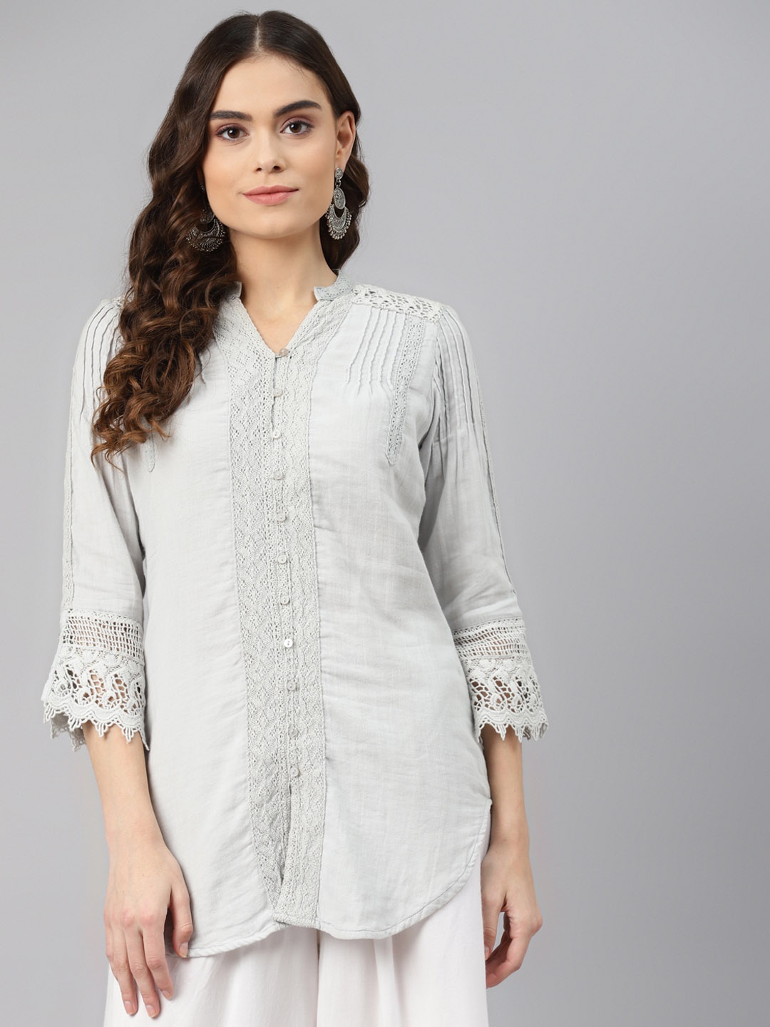 

Lakshita Blue Solid Kurti