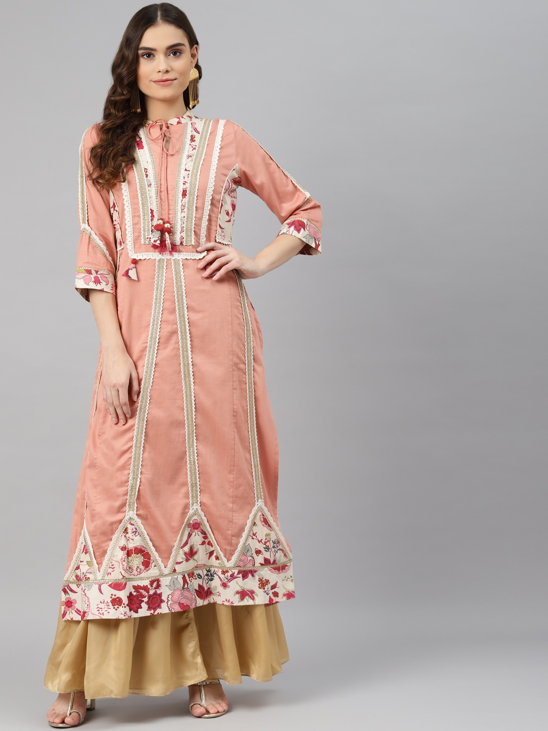 

Lakshita Peach-Coloured Solid Kurti