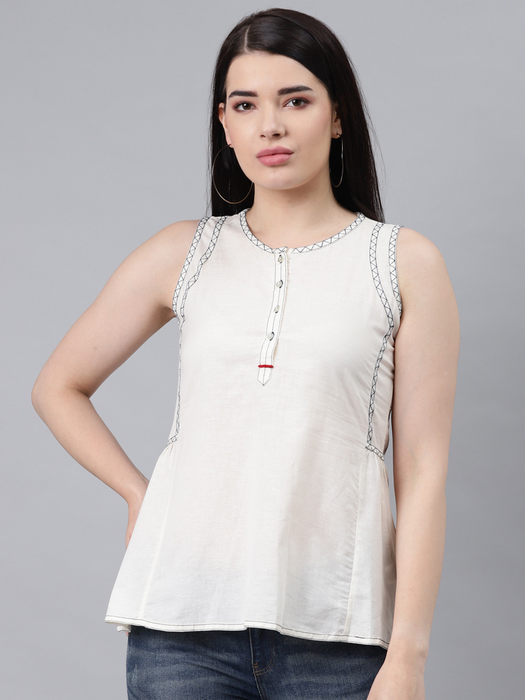 

Lakshita Off White Embroidered Peplum Top