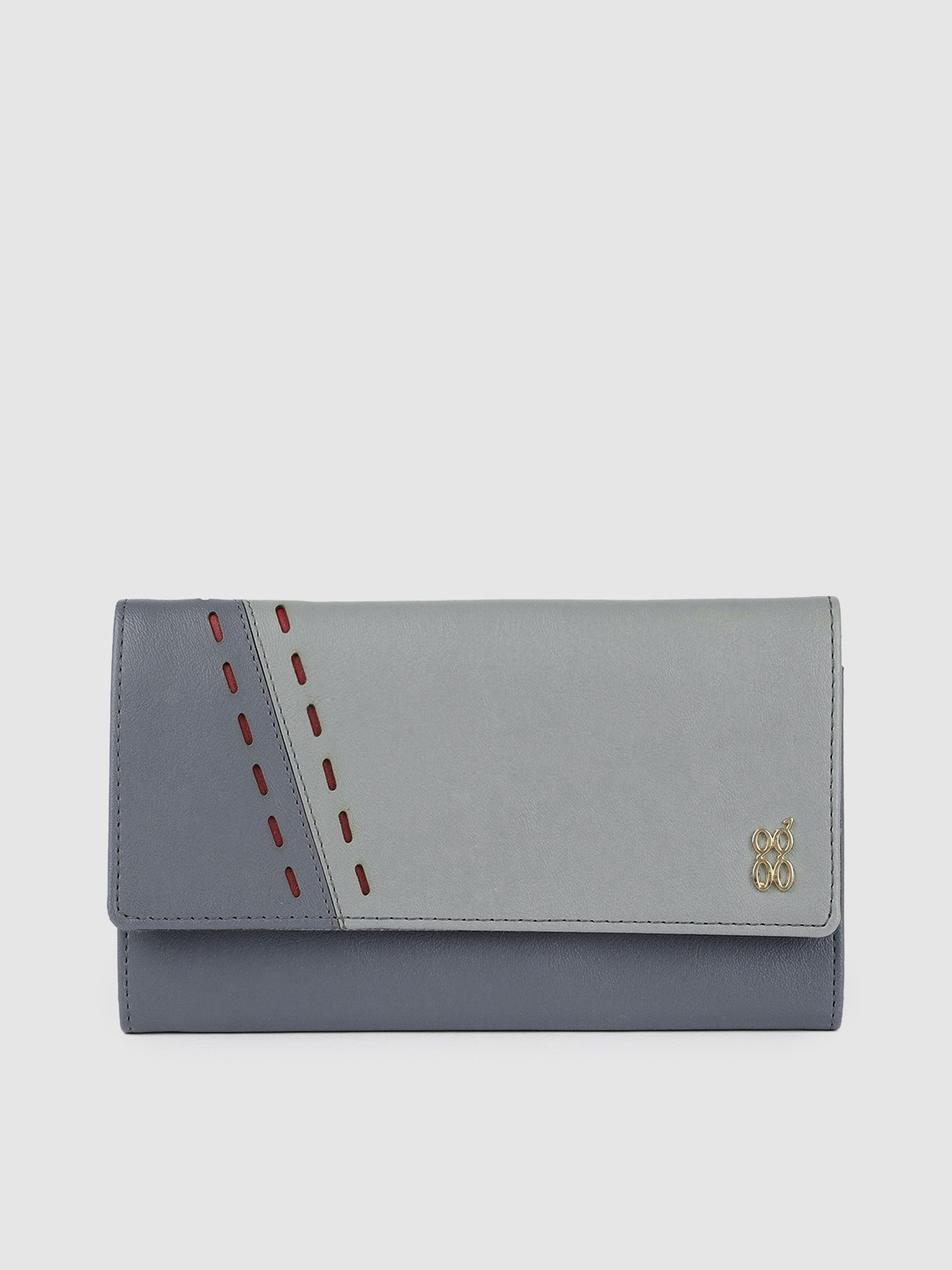 

Baggit Women Blue Solid Cut Work Synthetic Three Fold Wallet