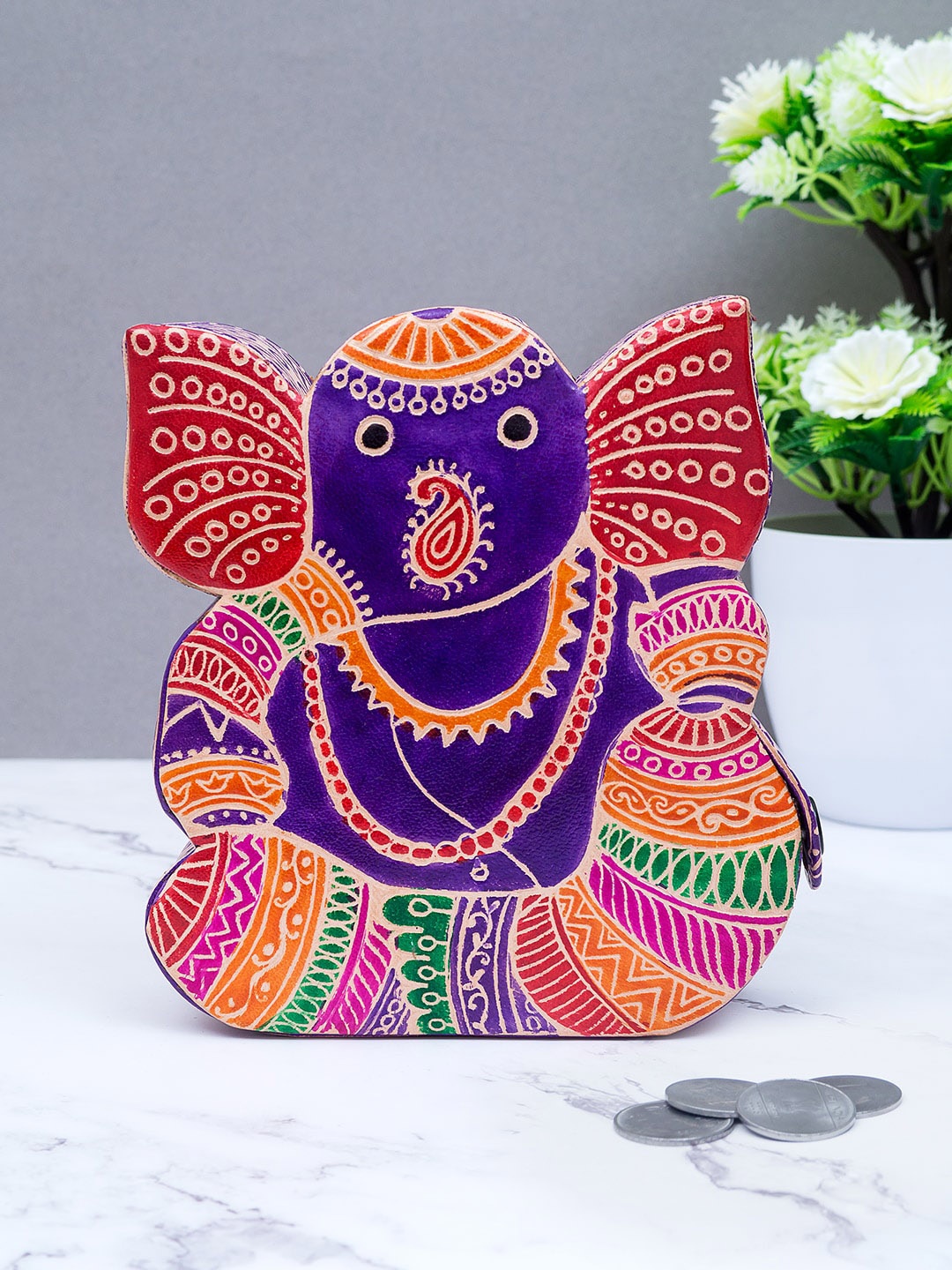

Golden Peacock Multicoloured Handcrafted Ganesha-Shaped Pure Leather Piggy Bank Showpiece, Multi