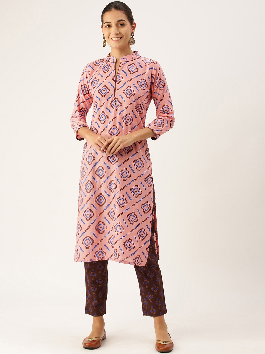 

Minora Women Pink Floral Printed Regular Pure Cotton Kurta with Palazzos
