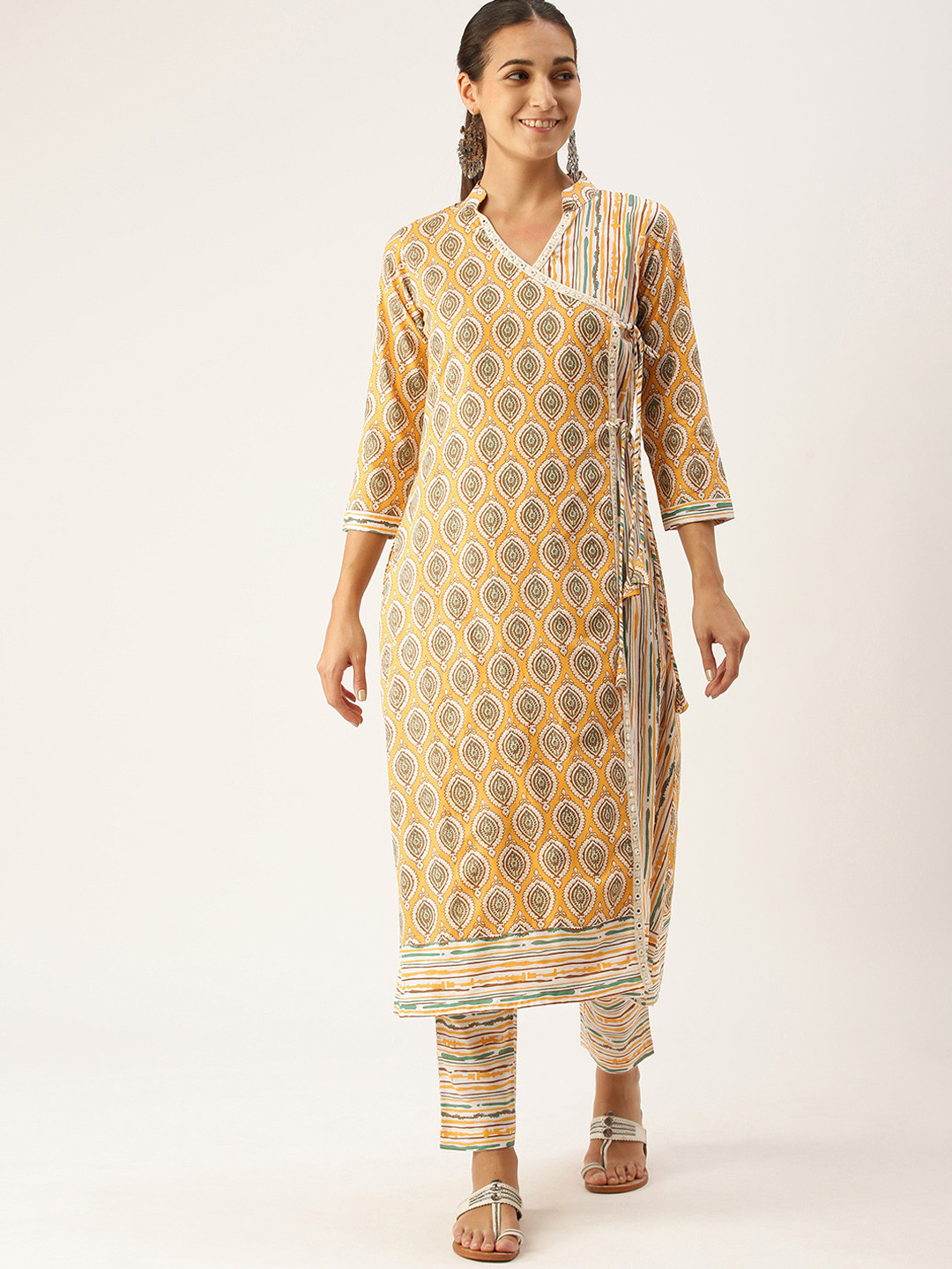 

Minora Women Mustard Yellow Floral Printed Regular Pure Cotton Kurta with Trousers