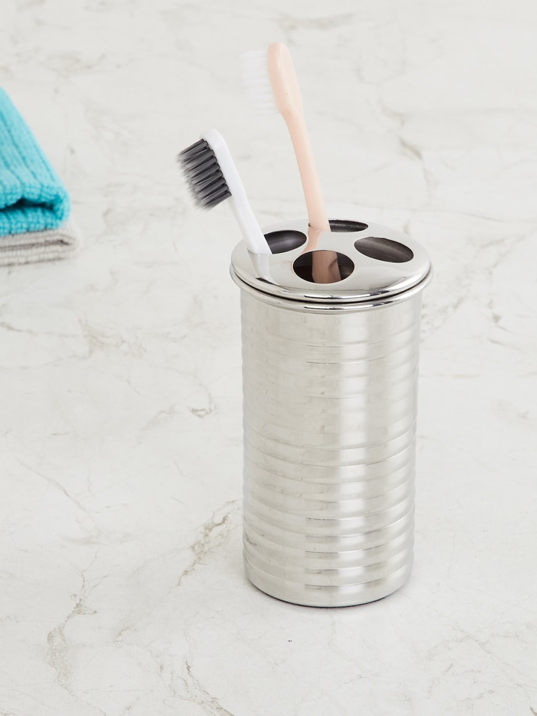 

Home Centre Silver Stainless Steel Toothbrush Holder