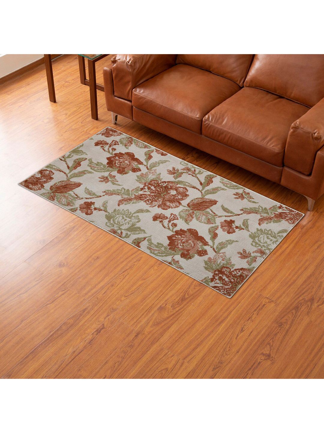 

Home Centre Red & Green Floral Woven Carpet