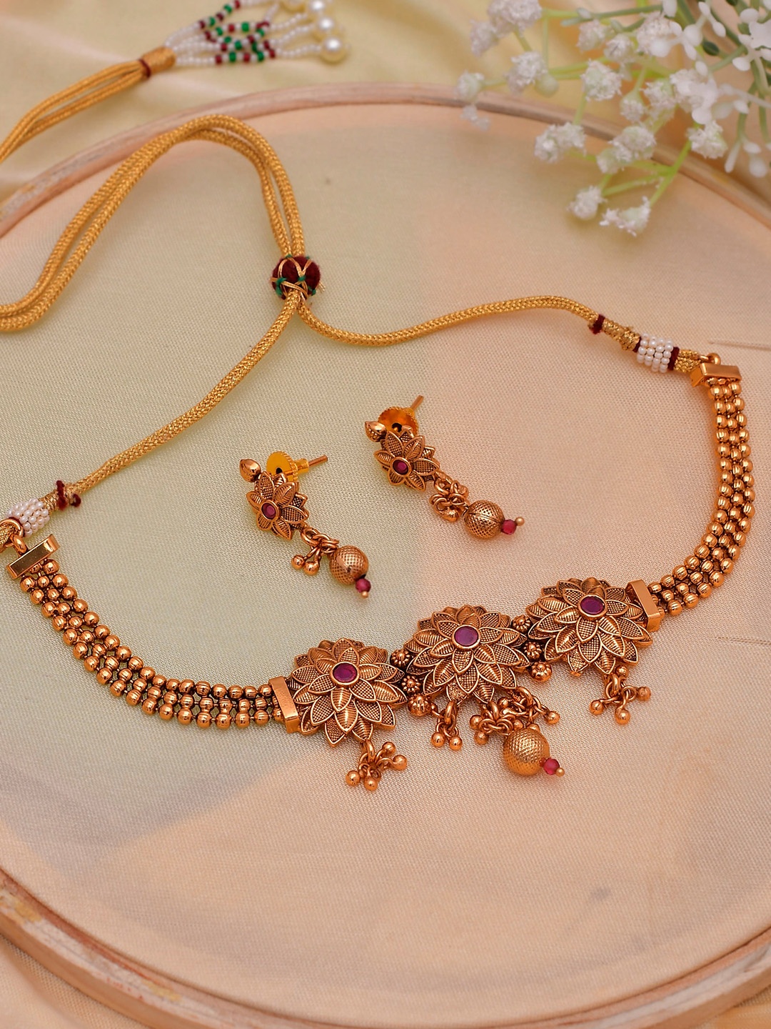 

Shoshaa Gold-Toned Pink Gold-Plated Stone Studded Handcrafted Jewellery Set