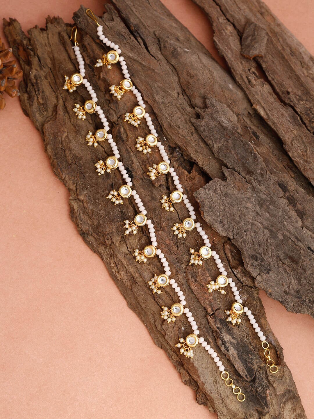 

Ruby Raang Set Of 2 Gold-Plated & White Handcrafted Kundan-Studded Beaded Anklets