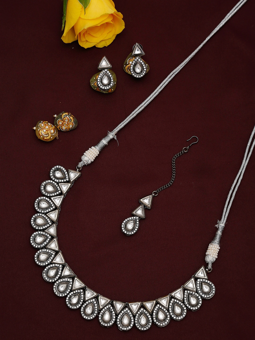 

Ruby Raang Silver Kundan Choker with Earrings and Maang Tikka