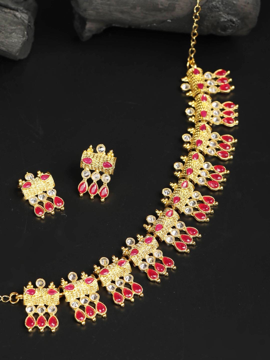 

Priyaasi Gold Plated Red & White Stone Studded Jewellery Set