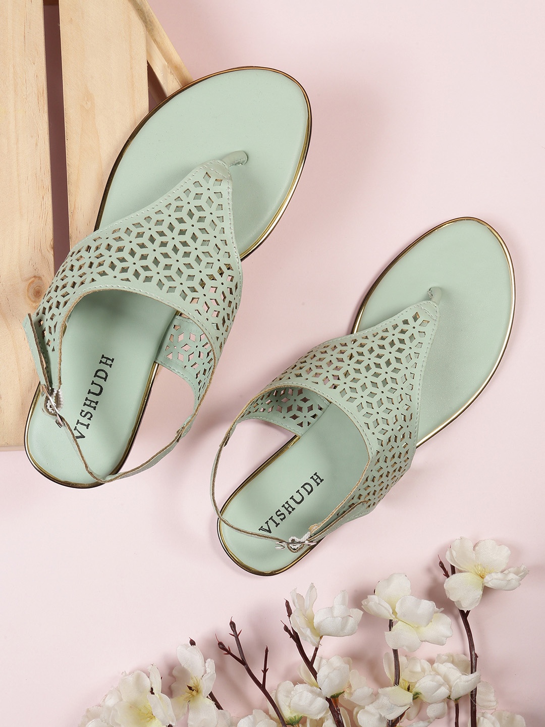 

Vishudh Women Sea Green T-Strap Flats with Laser Cuts