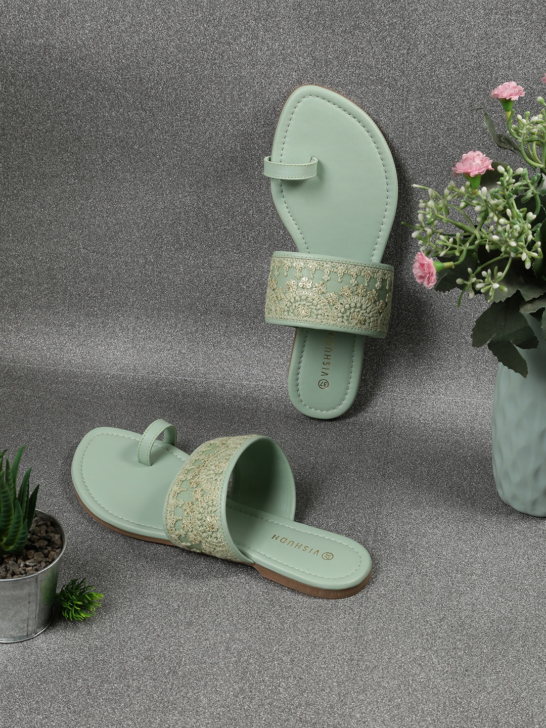 

Vishudh Women Sea Green Embellished One Toe Flats
