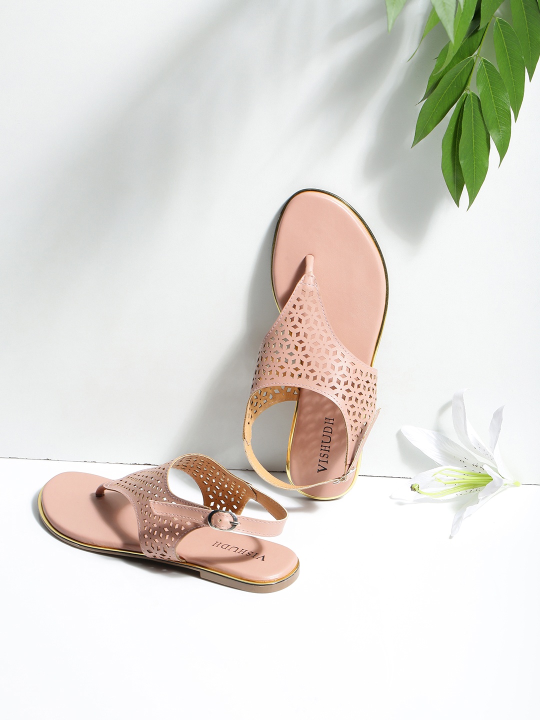 

Vishudh Women Peach-Coloured Textured T-Strap Flats with Laser Cuts