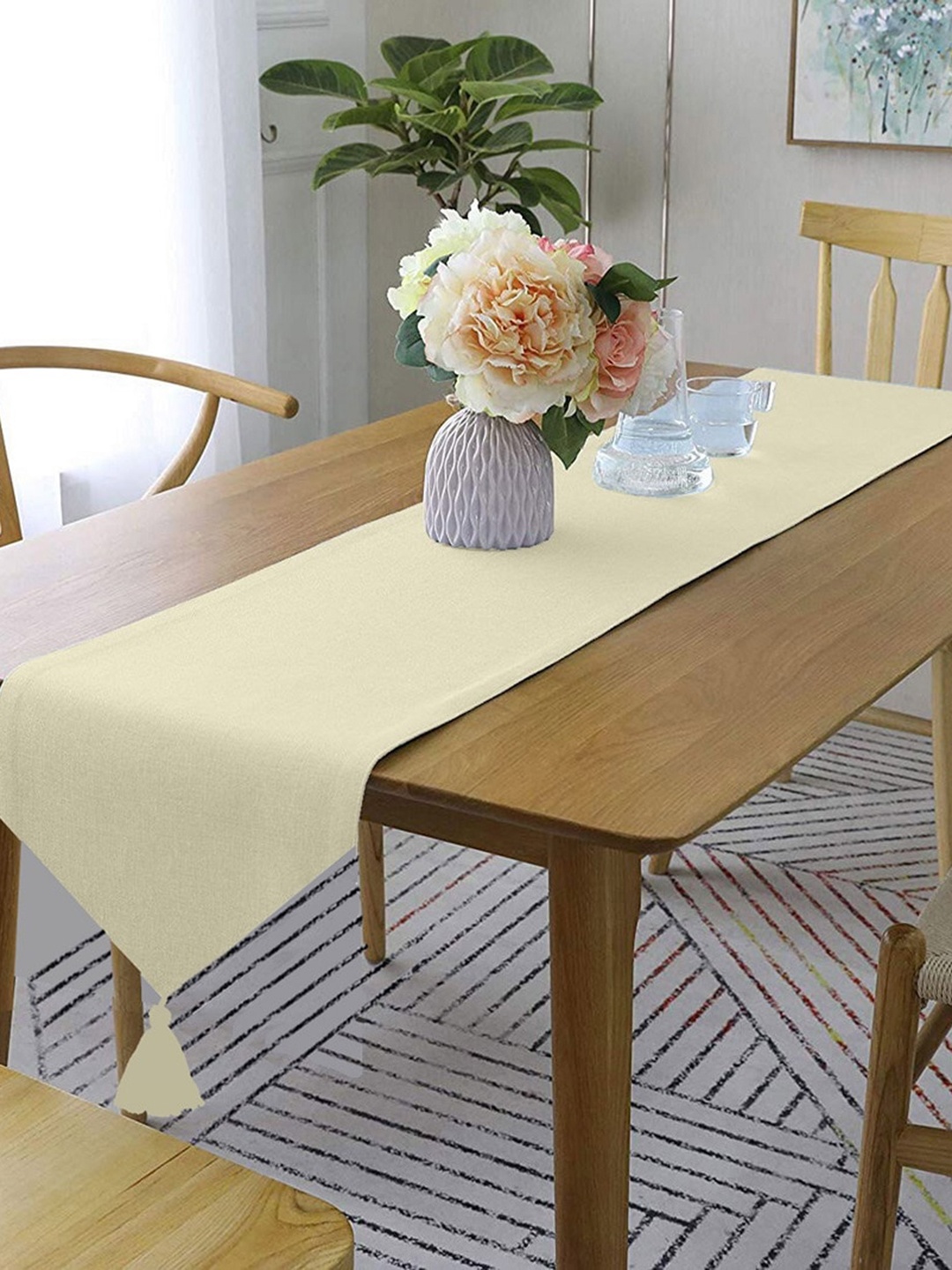 

Lushomes Beige Solid Classic Pure Cotton Dining Table Runner with Tassel